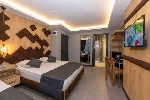 Deluxe Tek Büyük veya İki Ayrı Yataklı Oda