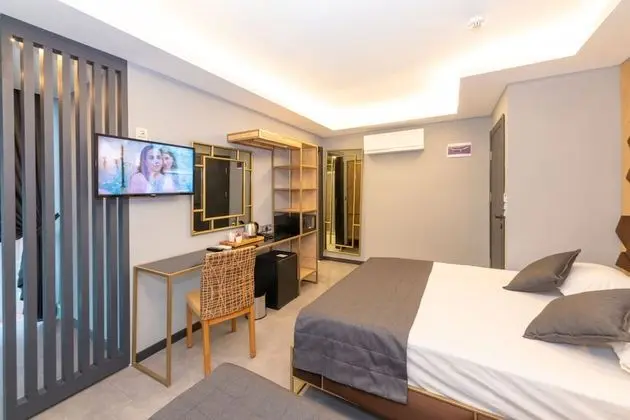 Deluxe Tek Büyük veya İki Ayrı Yataklı Oda