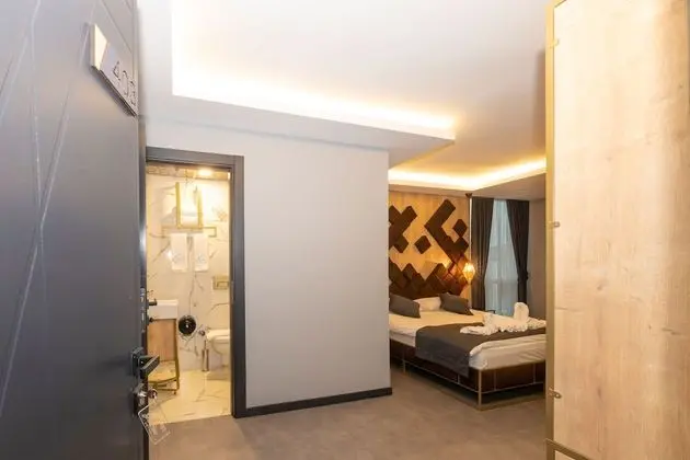 Deluxe Tek Büyük veya İki Ayrı Yataklı Oda