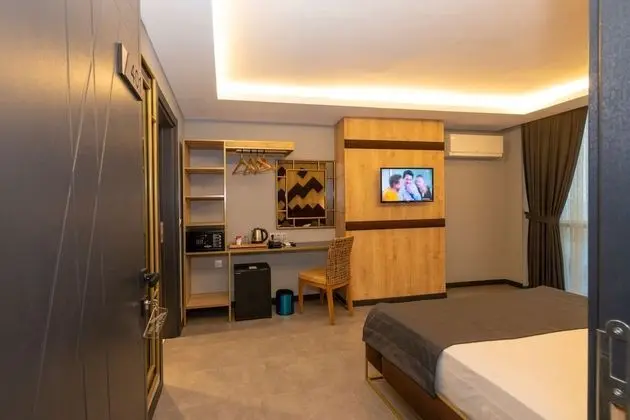 Deluxe Tek Büyük veya İki Ayrı Yataklı Oda