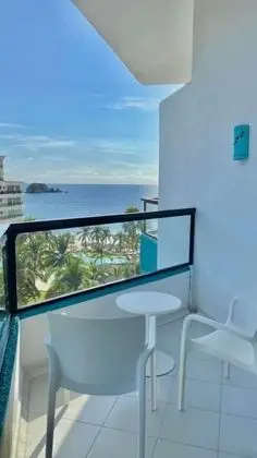 Deluxe Doble Vista Parcial al Mar