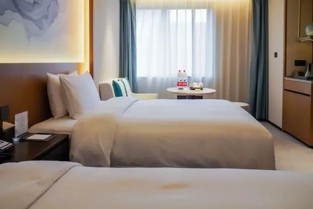Deluxe Tek Büyük veya İki Ayrı Yataklı Oda