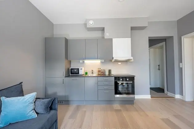 Three-Bedroom Apartment with Balcony