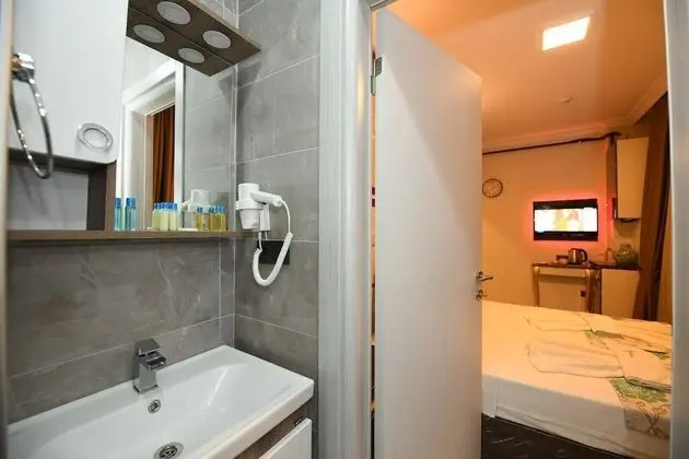 Deluxe Tek Büyük Yataklı Oda, 1 Çift Kişilik Yatak, Sigara İçilebilir