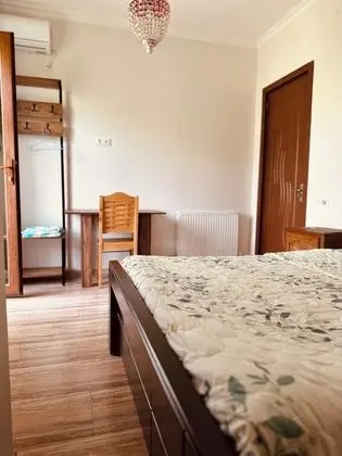 Üç Kişilik Oda, Bahçe Manzaralı