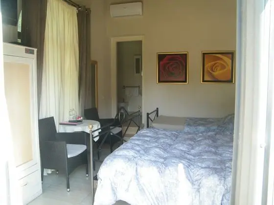 Comfort Üç Kişilik Oda, Bahçe Manzaralı
