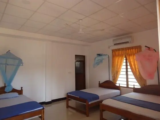 Basic Üç Kişilik Oda, Bahçe Manzaralı
