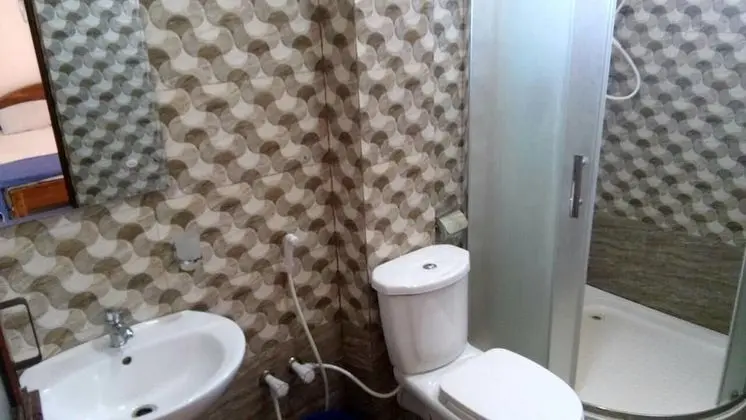 Basic Üç Kişilik Oda, Bahçe Manzaralı