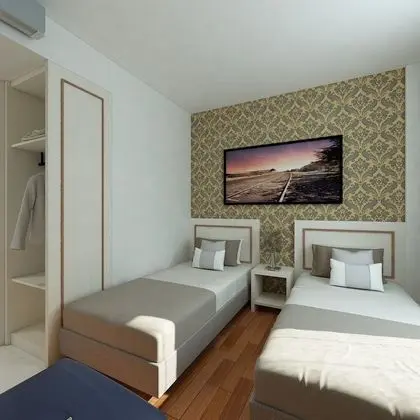 Deluxe Tek Büyük veya İki Ayrı Yataklı Oda