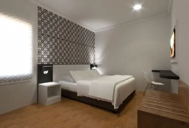 Deluxe Tek Büyük veya İki Ayrı Yataklı Oda