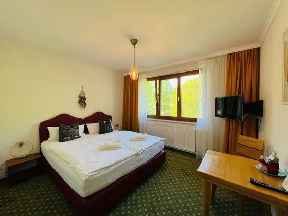 Basic Tek Büyük veya İki Ayrı Yataklı Oda