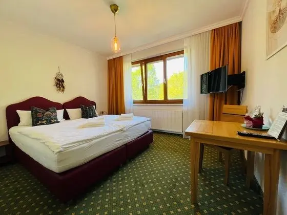 Basic Tek Büyük veya İki Ayrı Yataklı Oda