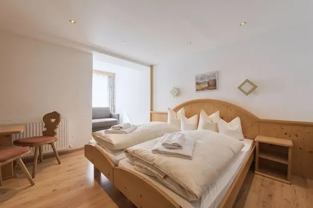 Double room with 1 extra bed. 2 Adults + 1 Child