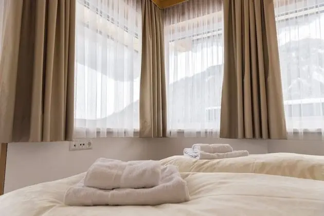 Double room with 1 extra bed. 2 Adults + 1 Child