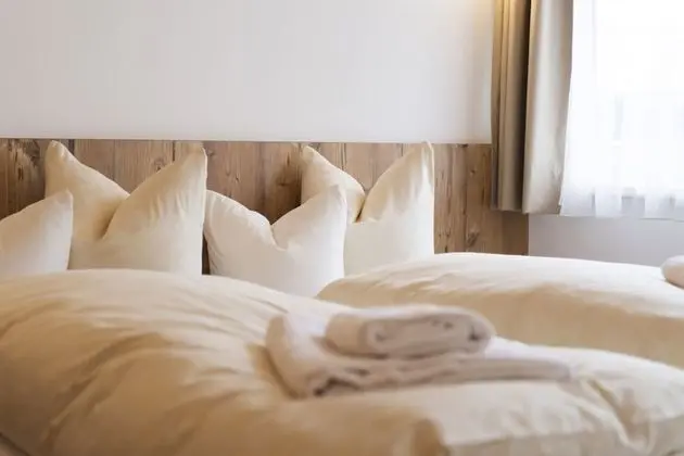 Double room with 2 extra beds. 2 Adults + 2 Children