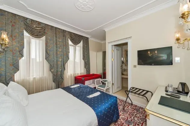 Deluxe Üç Kişilik Oda