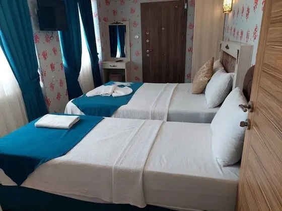 Üç Kişilik Oda