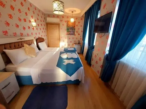 Üç Kişilik Oda