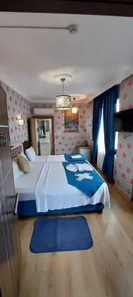 Üç Kişilik Oda