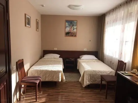 Comfort Tek Büyük veya İki Ayrı Yataklı Oda