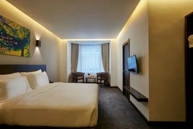 Deluxe Tek Büyük veya İki Ayrı Yataklı Oda, Sigara İçilmez, Avlu Manzaralı