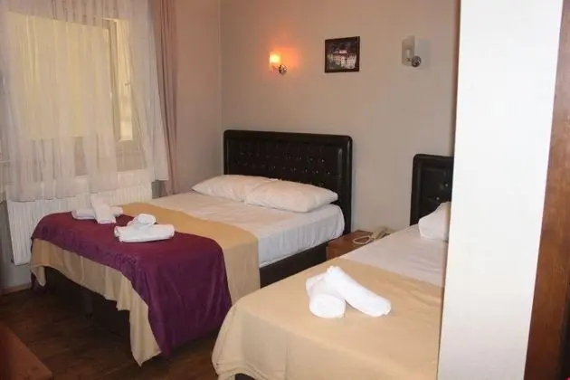 Üç Kişilik Oda