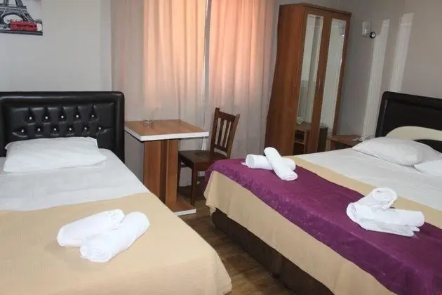 Üç Kişilik Oda