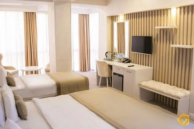 Deluxe Üç Kişilik Oda, Birden Çok Yatak