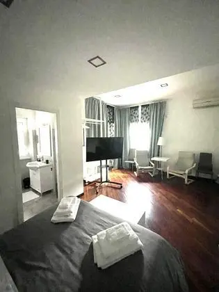 Deluxe Üç Kişilik Oda, Banyolu/Duşlu, Bahçe Manzaralı