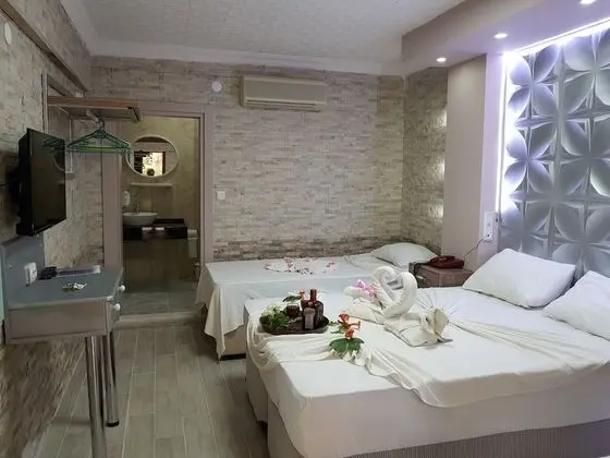Honeymoon Üç Kişilik Oda