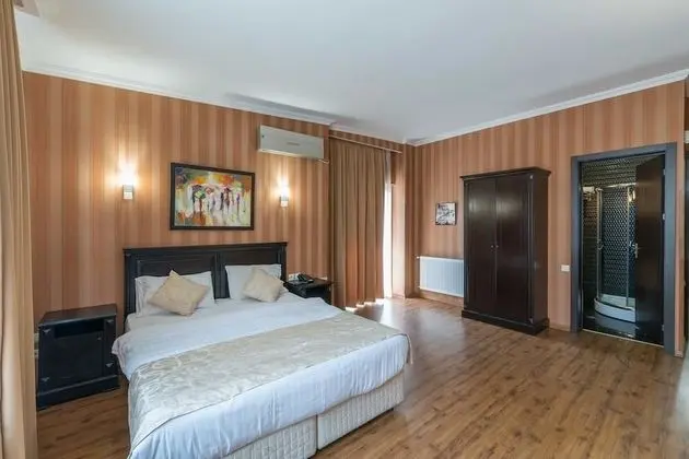Deluxe Tek Büyük veya İki Ayrı Yataklı Oda