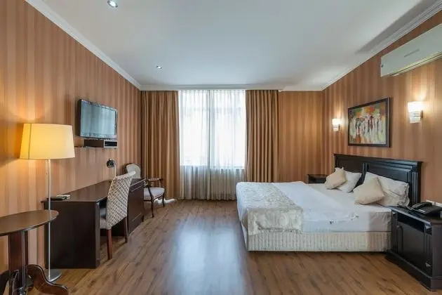 Deluxe Tek Büyük veya İki Ayrı Yataklı Oda