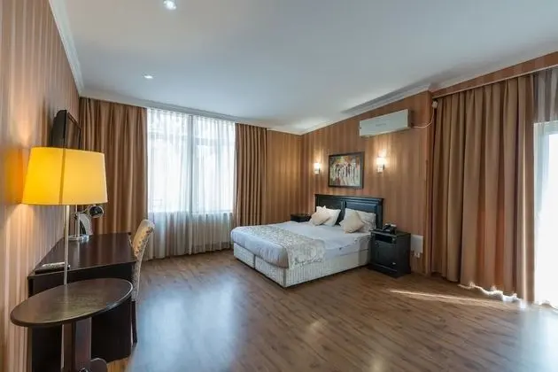 Deluxe Tek Büyük veya İki Ayrı Yataklı Oda