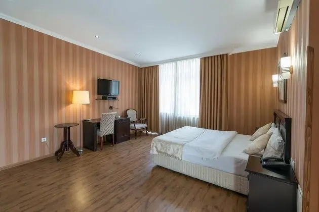 Deluxe Tek Büyük veya İki Ayrı Yataklı Oda