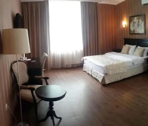 Deluxe Tek Büyük veya İki Ayrı Yataklı Oda
