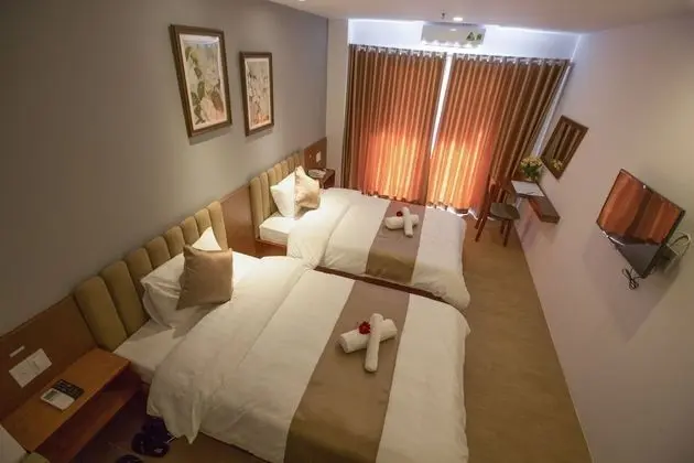 Deluxe Tek Büyük veya İki Ayrı Yataklı Oda