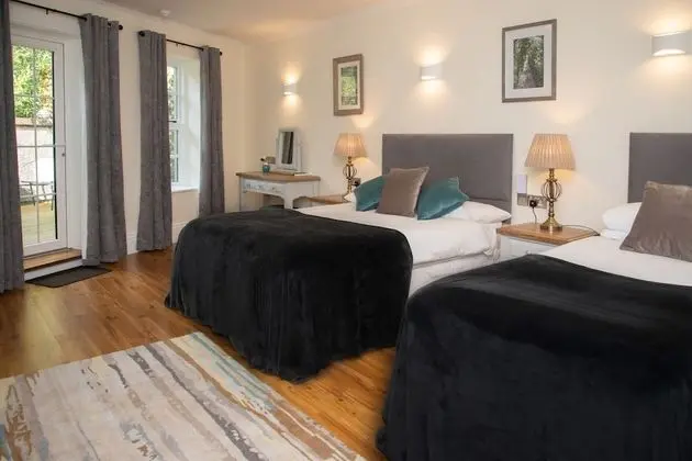 Deluxe Tek Büyük veya İki Ayrı Yataklı Oda