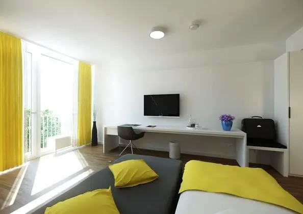 Comfort Tek Büyük veya İki Ayrı Yataklı Oda (Kitchenette on request)