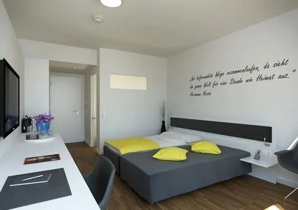 Comfort Tek Büyük veya İki Ayrı Yataklı Oda (Kitchenette on request)