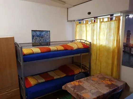 Üç Kişilik Oda