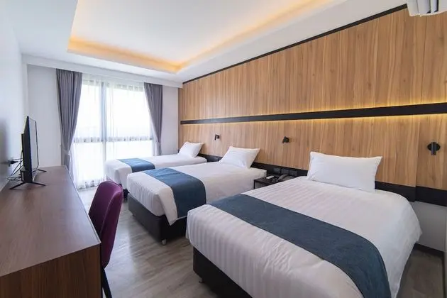 Deluxe Üç Kişilik Oda