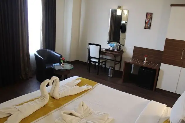 Deluxe Tek Büyük veya İki Ayrı Yataklı Oda