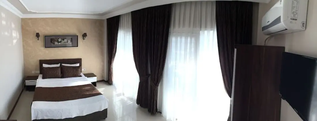 Deluxe Üç Kişilik Oda