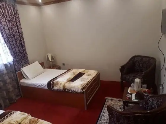 Deluxe Tek Büyük veya İki Ayrı Yataklı Oda