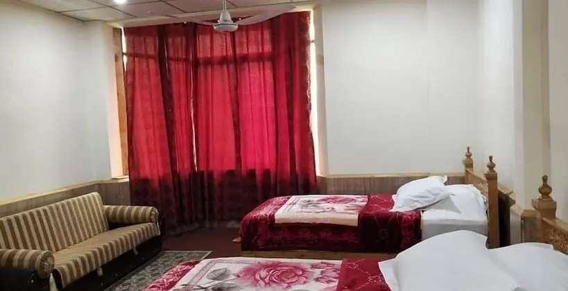 Deluxe Tek Büyük veya İki Ayrı Yataklı Oda
