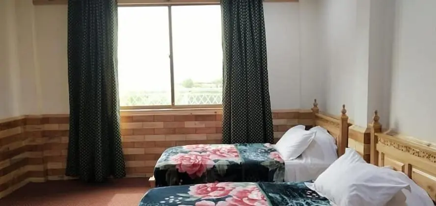 Deluxe Tek Büyük veya İki Ayrı Yataklı Oda