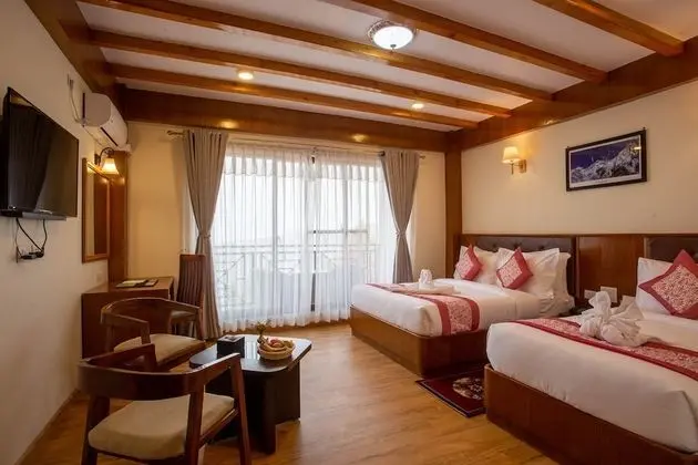 Deluxe Tek Büyük veya İki Ayrı Yataklı Oda