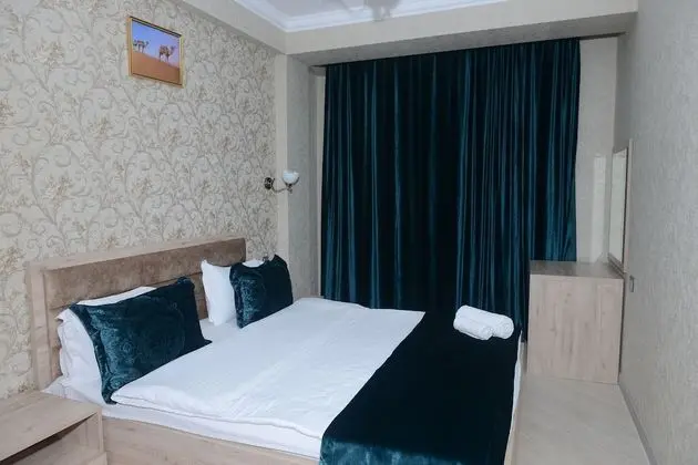 Deluxe Tek Büyük veya İki Ayrı Yataklı Oda