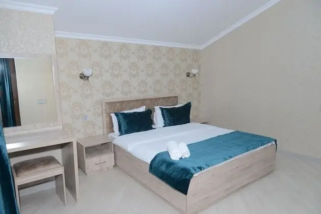 Deluxe Tek Büyük veya İki Ayrı Yataklı Oda