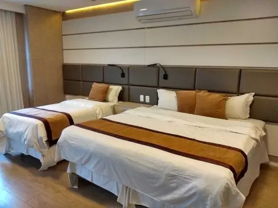 Quarto Luxo Triplo, tipo de camas